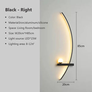 The Arc Wall Sconce is a stylish and modern lighting solution with a sleek wall-mounted fixture made of black iron, aluminum, and silicone. It features a 15W LED light source and measures H85cm x W20cm, making it perfect for minimalist bedroom lighting in areas ranging from 8-12 square meters.