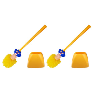 Two Trump Tidy Toilet Brushes with humorous novelty doll heads and matching yellow holders are displayed side by side on a white background, offering a unique and fun bathroom accessory for cleaning.