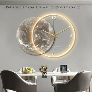 The Celestial Wall Clock Light, featuring a lunar design over cosmic imagery, hangs above a dining table. It showcases luminous numbers and hands, adding a universal touch to your space.