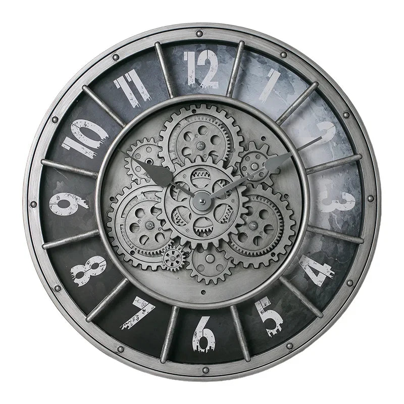 The Industrial Gearworks Wall Clock is a round steampunk style clock featuring visible metal gears in the center and distressed white numerals on a dark background. The time displayed is 1:52.