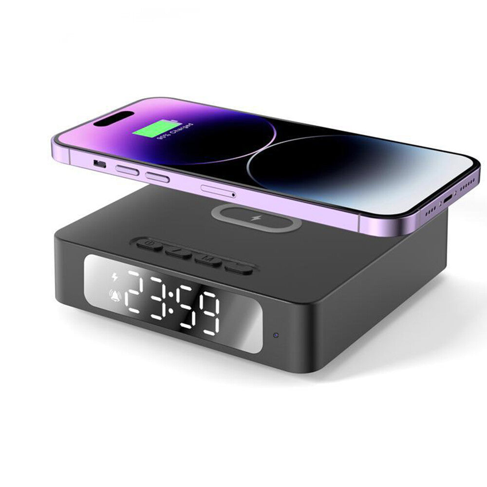 The Wireless Charger Clock SpyCam features wireless smartphone charging, a black LED display with control buttons, and built-in motion detection.
