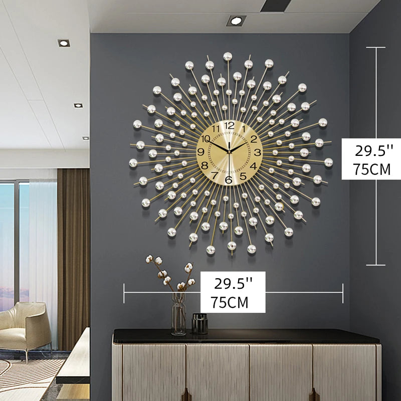 The Lux Radiance Starburst Wall Clock, gold and silver with a 29.5-inch (75 cm) diameter, is showcased on a dark gray wall above a cabinet in a modern living room, creating a striking statement piece.
