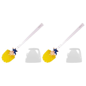 Two Trump Tidy Toilet Brushes featuring cartoon figure handles and yellow bristles, each beside a white holder, create a humorous novelty bathroom accessory set against a white background.
