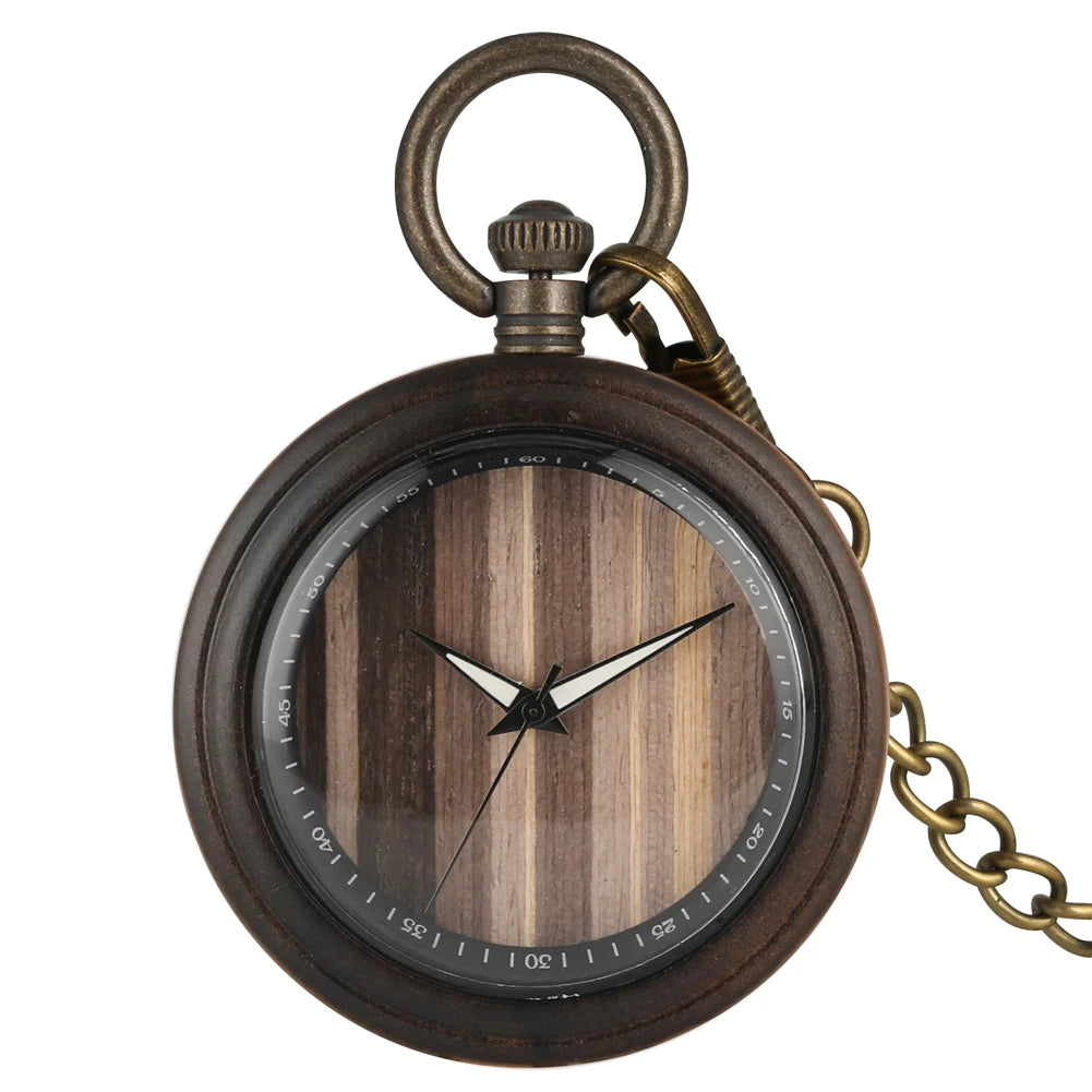 The Wooden Pocket Watch features a round face with a wooden texture, black hour and minute hands, plus a metal case and chain—an elegant choice for wood watch collectors or vintage pocket watch enthusiasts.