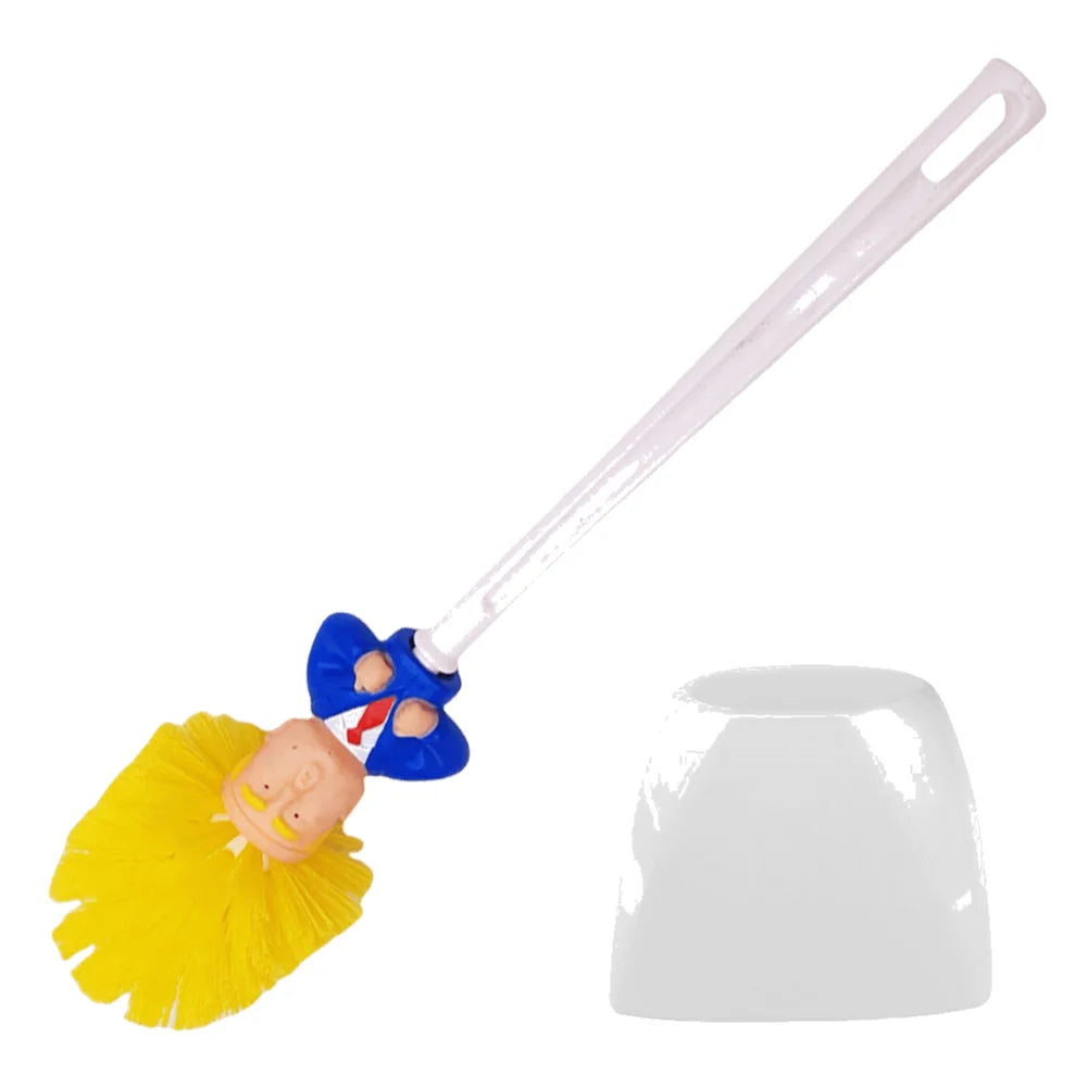 The Trump Tidy Toilet Brush features a cartoon Trump figure handle, yellow bristles resembling hair, and a white holder—a novelty bathroom accessory that makes cleaning more entertaining.