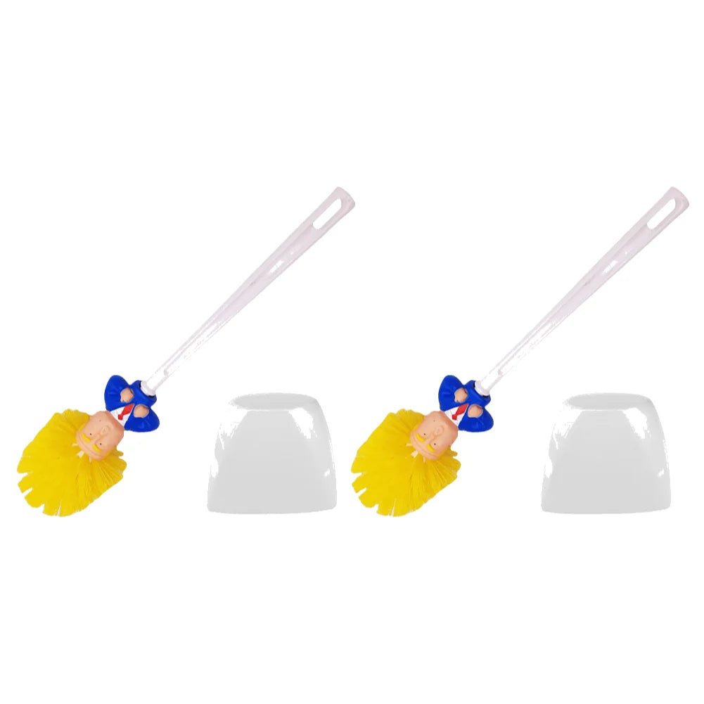 Two Trump Tidy Toilet Brush sets: Each includes a white holder, brush with yellow bristles, white handle, and a novelty doll head—adding humor to your bathroom cleaning routine.