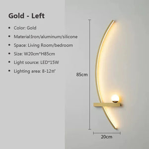 The Arc Wall Sconce is a wall-mounted, gold-colored LED light fixture with dimensions of 85cm by 20cm. It's perfect for minimalist bedroom or living room lighting, made from iron, aluminum, and silicone. It effectively illuminates an area of 8-12 square meters.