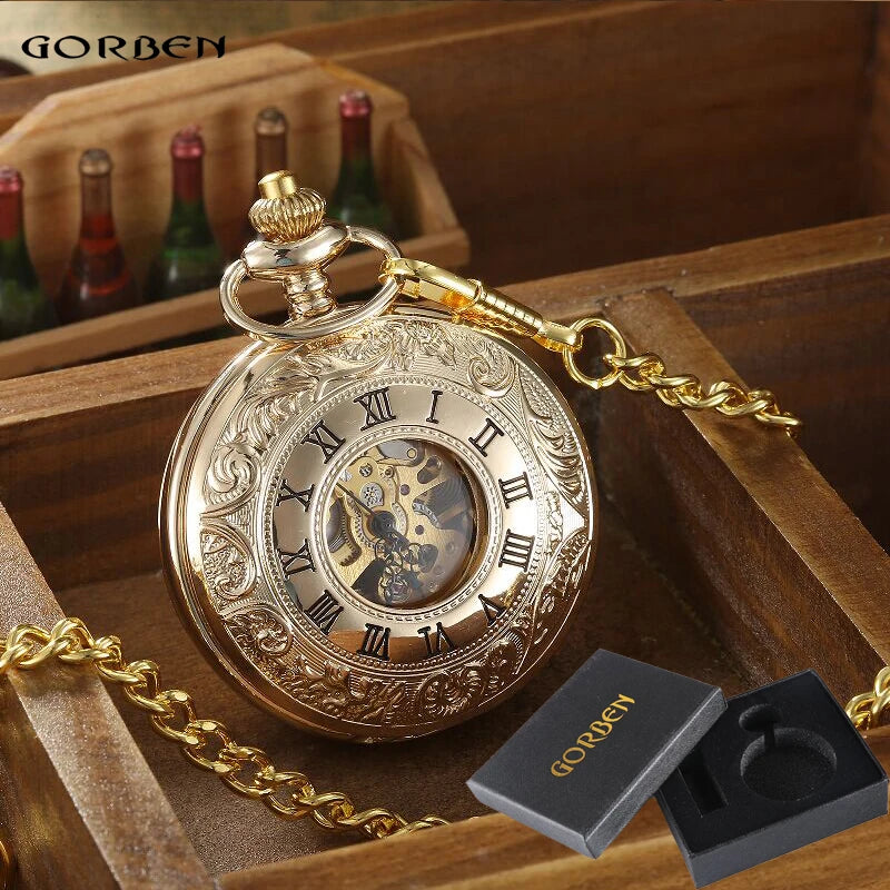 A Vintage Mechanical Pocket Watch with Roman numerals and visible movement on a gold chain is displayed next to a black Gorben-branded box.