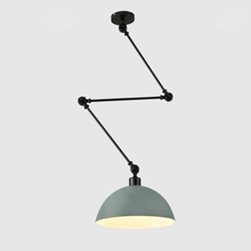 The Zig Zag Pendant Light features a ceiling-mounted matte black adjustable arm and a gray dome-shaped shade, offering an industrial design that casts light downward against a plain background.