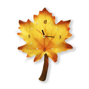 The Wooden Grain Wall Clock, crafted in the shape of a yellow maple leaf, features numbers and clock hands at its center, capturing the essence of a rustic natural wall clock.