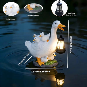 The Solar Duck Lamp is a charming white duck figurine with five goslings, floating on water while holding a solar-powered lantern. Featuring energy-saving technology and realistic details, it makes an ideal garden lamp for any outdoor space, with labeled dimensions and features for added convenience.