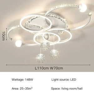 The Elegant Multi-Ring Ceiling Light features three hanging crystal spheres in a sculptural, modern design with a circular frame. Measuring 110cm by 70cm with a height of 10cm, this striking 148W fixture is perfect for living rooms or halls and effectively illuminates areas of 25–35m².