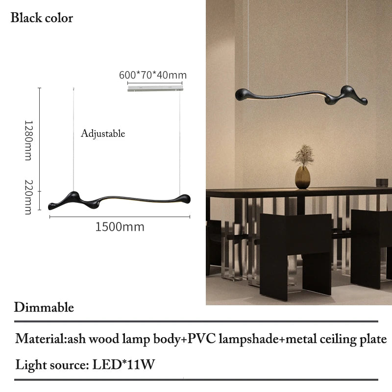 The Tideform Biomorphic Pendant Light features an abstract, wavy design in black, blending Nordic minimalism above your dining table. This sculptural LED fixture includes full measurements and material details.