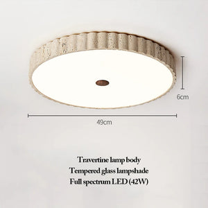 Introducing the Natural Stone Ceiling Light—a timeless fixture showcasing a circular design crafted from natural travertine stone. This elegant ceiling light features a tempered glass lampshade and is powered by a full-spectrum 42W LED. Inspired by wabi-sabi lighting principles, its understated form measures 49 cm in width and 6 cm in height, making it a sophisticated addition to any space.