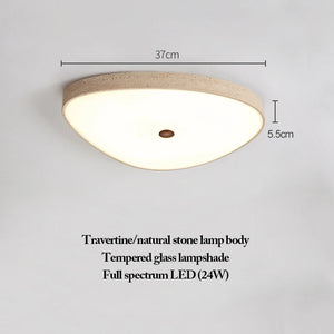Natural Stone Ceiling Light—crafted with a triangular travertine body, tempered glass lampshade, and a 24W full spectrum LED—reflects the refined elegance of wabi-sabi lighting. Dimensions: 37 cm wide × 5.5 cm high.