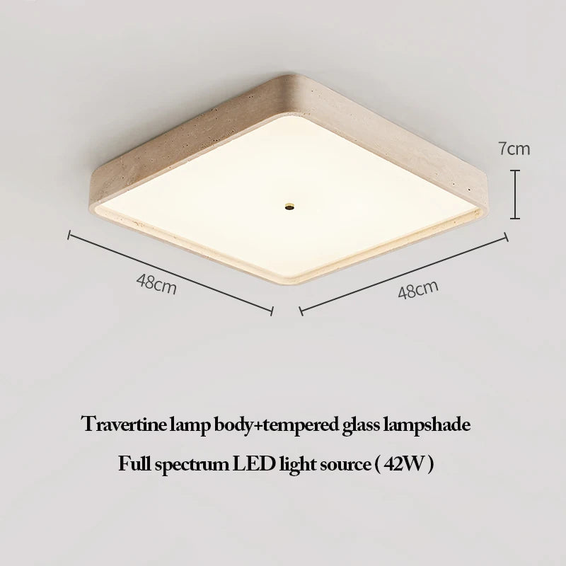 The Natural Stone Ceiling Light showcases a square travertine body, tempered glass shade, and full spectrum 42W LED; measuring 48 cm x 48 cm x 7 cm, it’s an ideal wabi-sabi lighting piece for sophisticated, organic interiors.