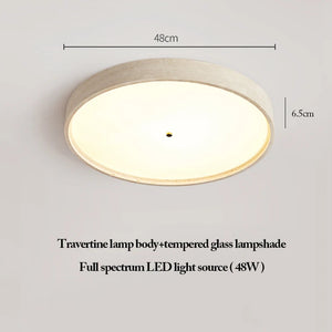 Introducing the Natural Stone Ceiling Light: effortlessly elegant and understated, this ceiling fixture boasts a round body crafted from travertine stone, beautifully paired with a tempered glass lampshade. With dimensions of 48 cm in diameter and 6.5 cm in height, it features a high-performance 48W full spectrum LED light source—ideal for bringing refined wabi-sabi style to any modern interior.