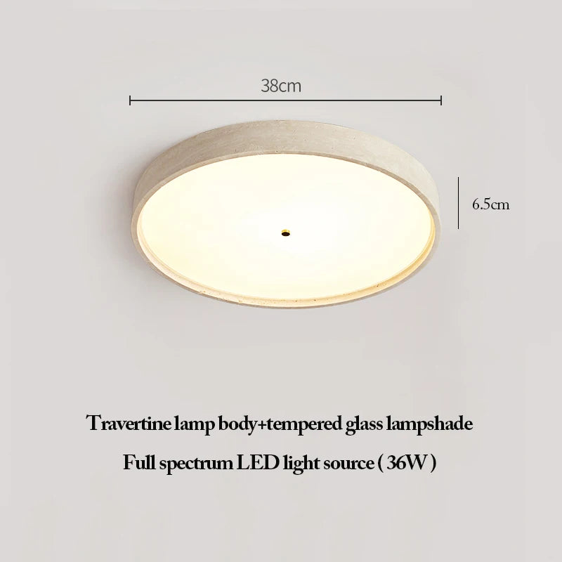 The Natural Stone Ceiling Light showcases a circular travertine body, tempered glass lampshade, and full-spectrum 36W LED. Measuring 38 cm in width and 6.5 cm in height, it offers an elegant wabi-sabi lighting solution.