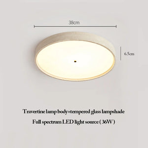 The Natural Stone Ceiling Light showcases a circular travertine body, tempered glass lampshade, and full-spectrum 36W LED. Measuring 38 cm in width and 6.5 cm in height, it offers an elegant wabi-sabi lighting solution.