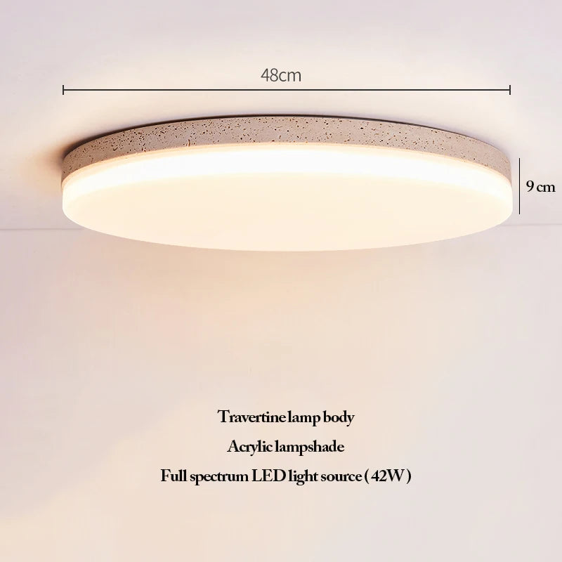 The Natural Stone Ceiling Light features a round LED design with a travertine body and an acrylic lampshade, measuring 48 cm in width and 9 cm in height, and offering 42W full spectrum illumination. This elegant ceiling light showcases the unique textures of travertine, adding a refined wabi-sabi touch to your space.