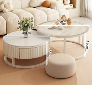 The living room features the Luxury Round Coffee Table Set—two 50cm high, 70cm wide minimalist round tables—and a 38cm high round ottoman.