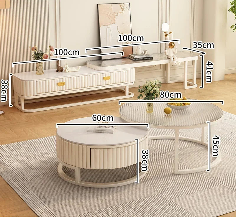 A living room featuring the Luxury Round Coffee Table Set and a TV console, each marked with dimensions in centimeters. The minimalist coffee table and white furniture add elegance atop a gray rug.