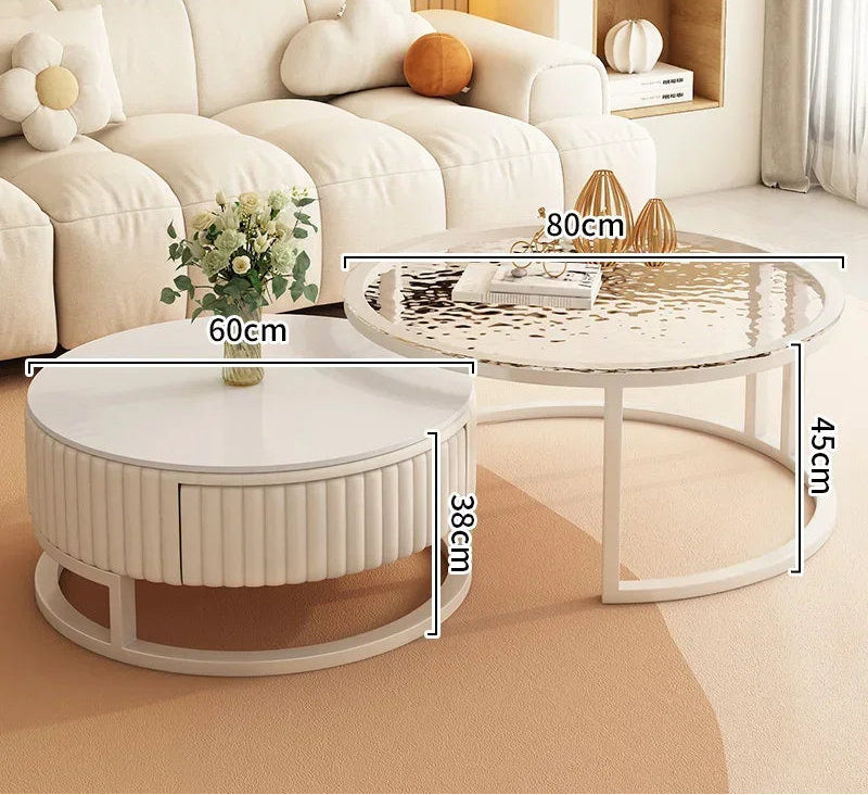The Luxury Round Coffee Table Set features two marble-look tables, 60cm and 80cm in diameter, adding a stylish focal point to your minimalist living room.