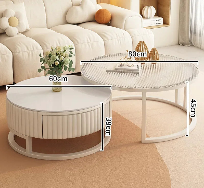 The Luxury Round Coffee Table Set features two minimalist tables for your living room: a smaller table (60cm wide, 38cm tall) and a larger table (80cm wide, 45cm tall).