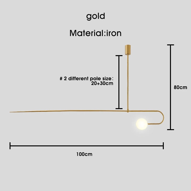 The Minimalist Line Light is a gold iron lamp featuring a sculptural design, offering 20cm and 30cm pole sizes, with dimensions of 80cm in height and 100cm in length. It embodies modern elegance with a minimal mounting system for seamless integration into any space.