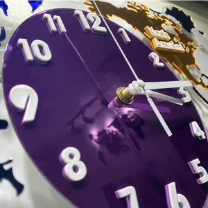 A purple wall clock adds a touch of travel inspiration to the room.