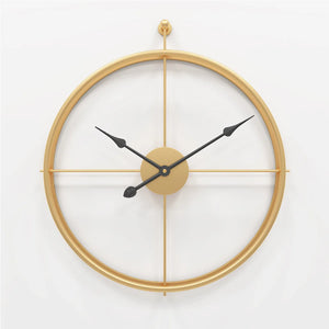 A minimalist ring wall clock with black hands mounted on a white wall.