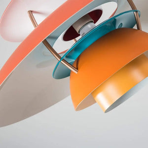 A Danish layered pendant light with an orange, blue, and yellow style.
