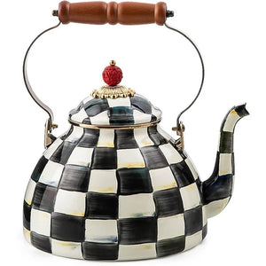 A decorative kettle in black and white checkered design.