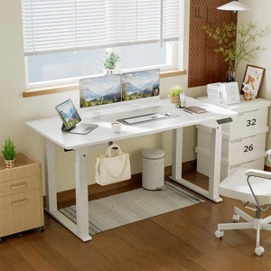 An adjustable white desk with two monitors and a chair.