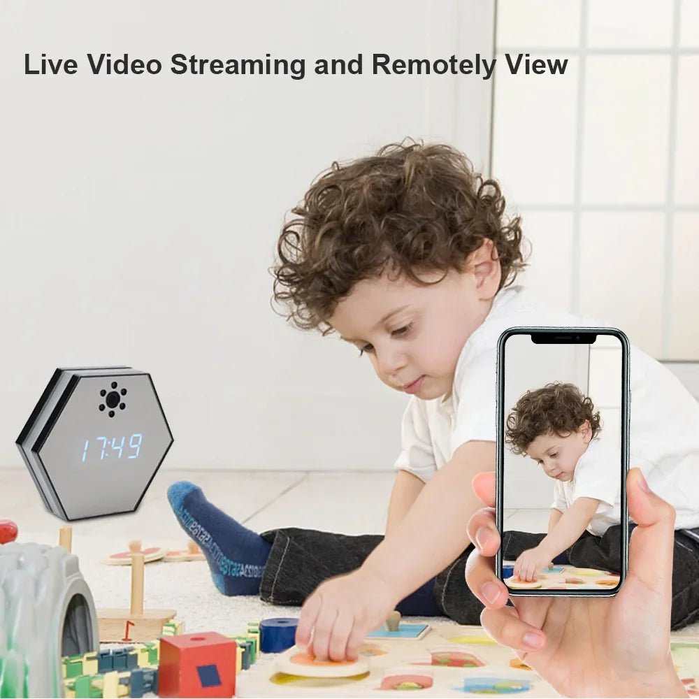 A young child plays with toys as a smartphone streams crisp, live video from the Sleek Clock SpyCam—a hexagonal camera clock offering 4K HD resolution for clear, remote monitoring.