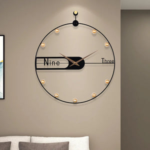 A living room with a modern Round Ring Wall Clock on the wall with tiny lights around the ring.