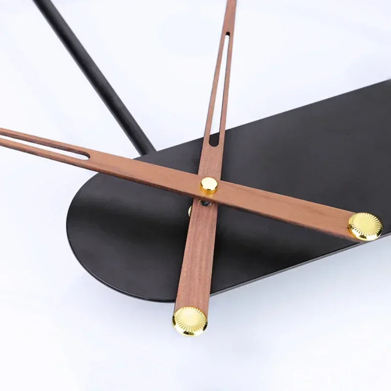 A living room with a modern Round Ring Wall Clock on the wall with tiny lights around the ring.