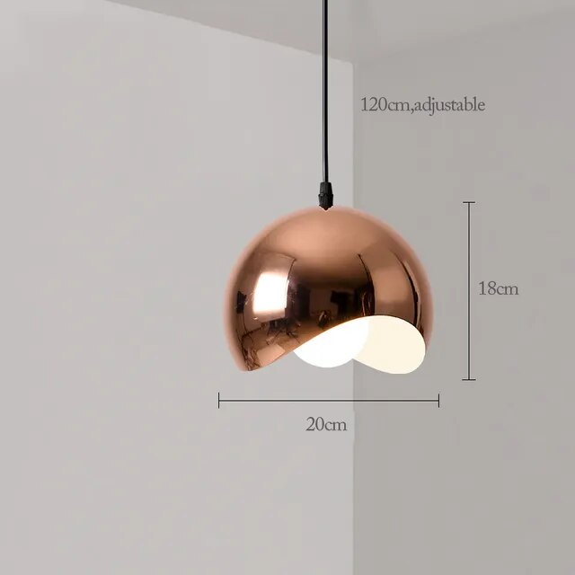 Discover the Nordic Rose Gold Pendant Light, a modern lighting piece with an adjustable 120cm cable. With dimensions of 18cm in height and a 20cm diameter, it brings sophistication and elegance to any space.